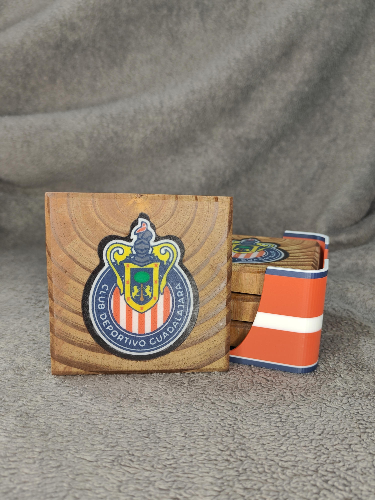 Chivas de Guadalajara coaster showing the full crest on reclaimed cedar beside a striped holder