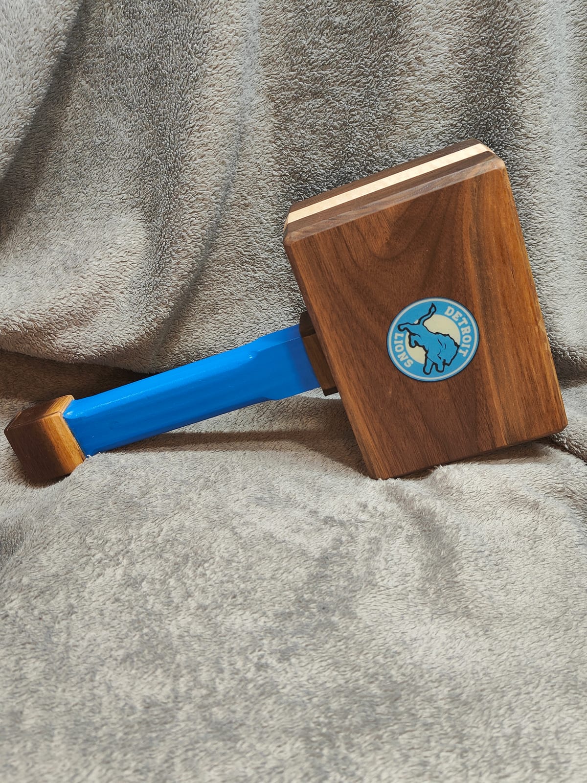 Handcrafted Detroit Lions wooden mallet with a blue handle