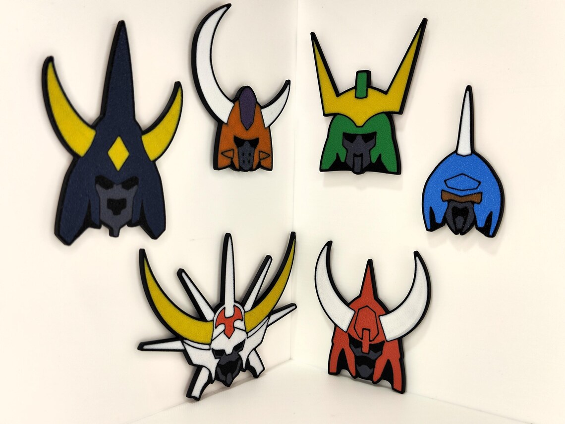A lineup of Ronin Warriors magnet pieces arranged across a white background